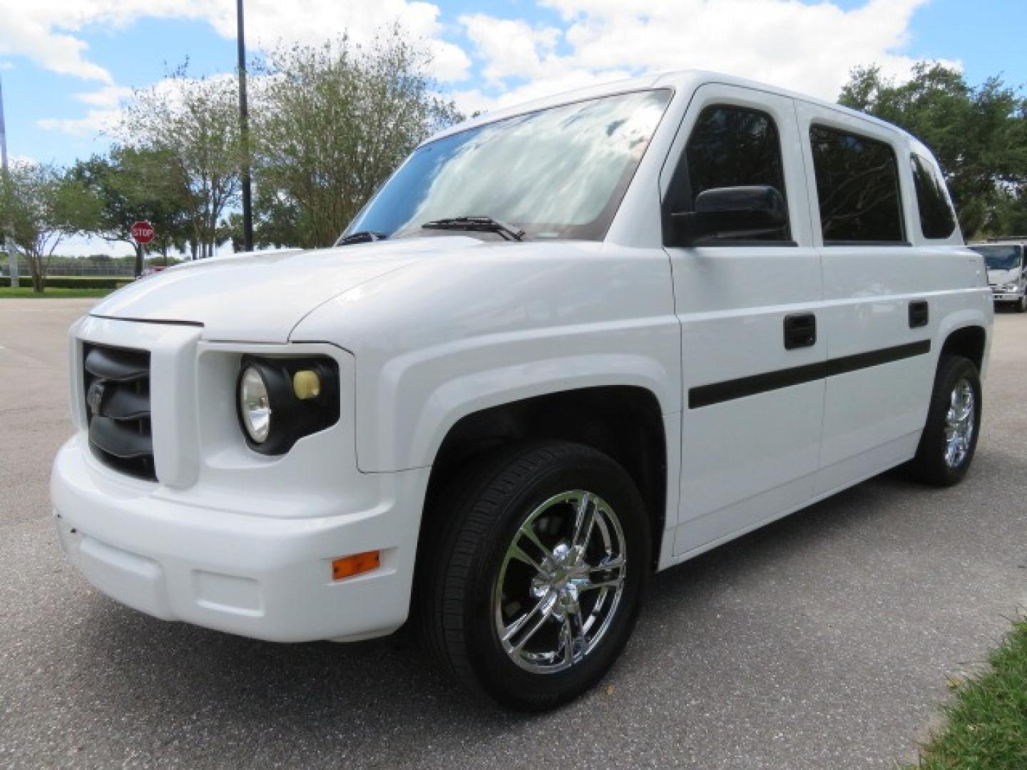 2012 White /Black with an 4.6L V8 engine, Automatic transmission, located at 4301 Oak Circle #19, Boca Raton, FL, 33431, (954) 561-2499, 26.388861, -80.084038 - You are looking at a Gorgeous 2012 Mobility Ventures MV1 Handicap Wheelchair Conversion Van with 64K Original Miles, 4.6L Ford V8, Bleack Leather Type Interior, Alloy Wheels, Power Side Entry Wheelchair Lift with Long Ramp and Short Ramp Function, Q Lock 150 EZ Lock, L-Track Tie Down System, Back Up - Photo#11